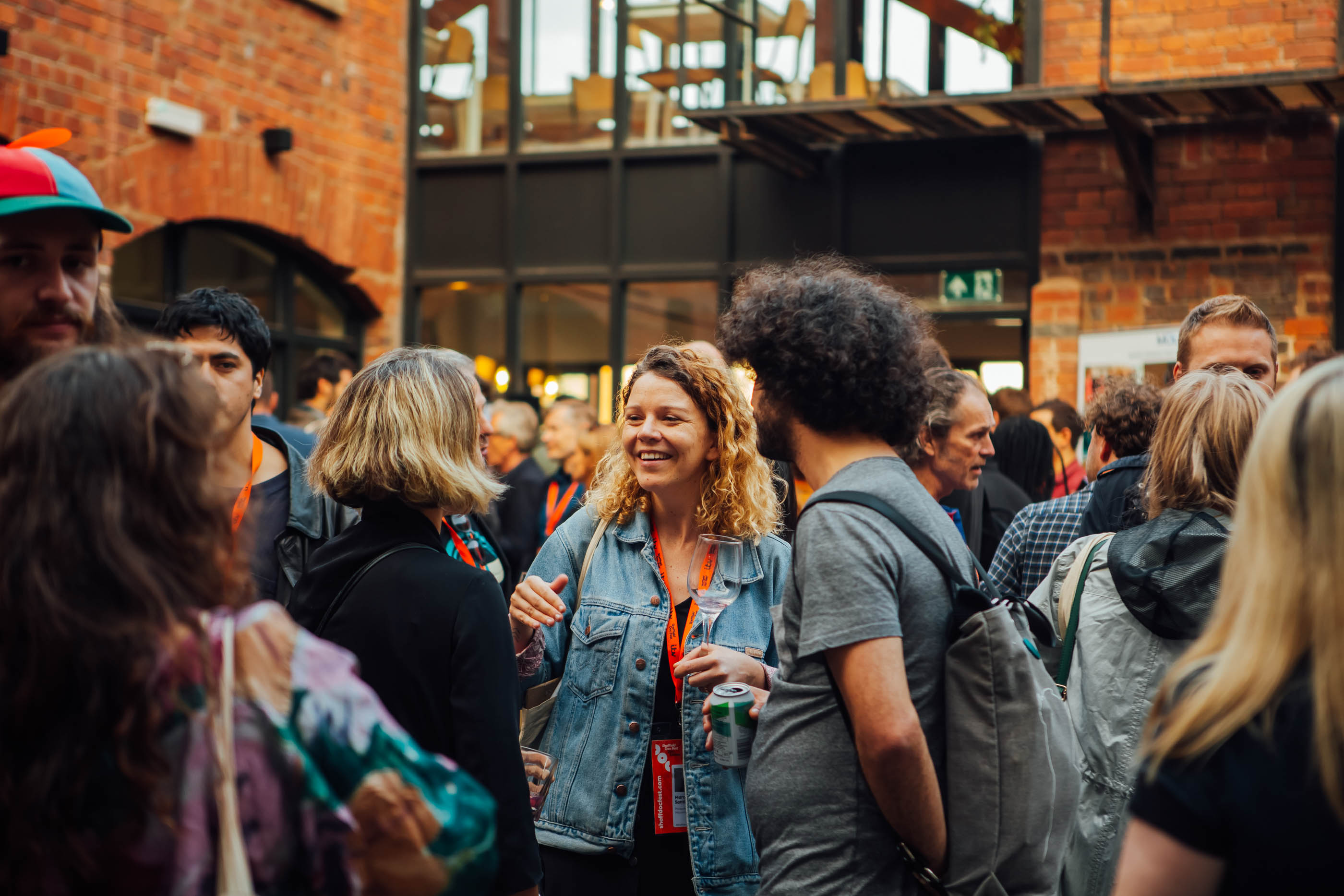 DocFest attendees enjoying a festival event in an outside venue