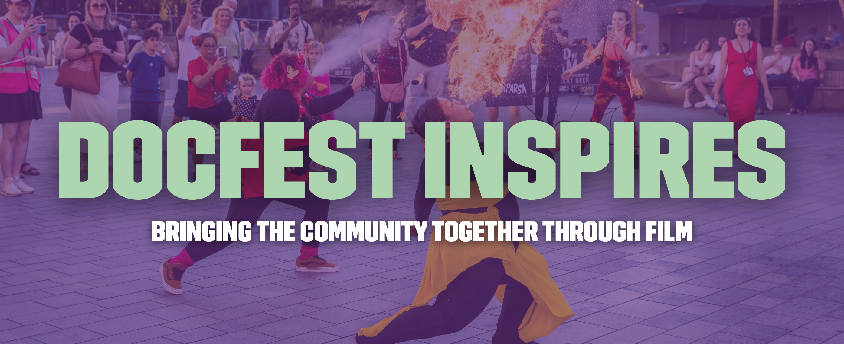 A banner with text reading "DocFest Inspires - Bringing the community together through film"