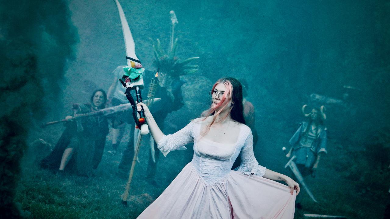 poster of character wielding foam sword