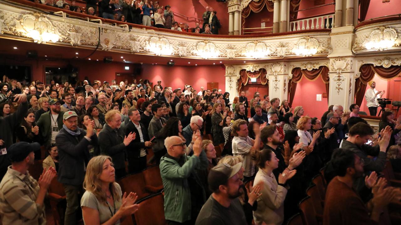 A standing ovation at a theatre during Sheffield DocFest.