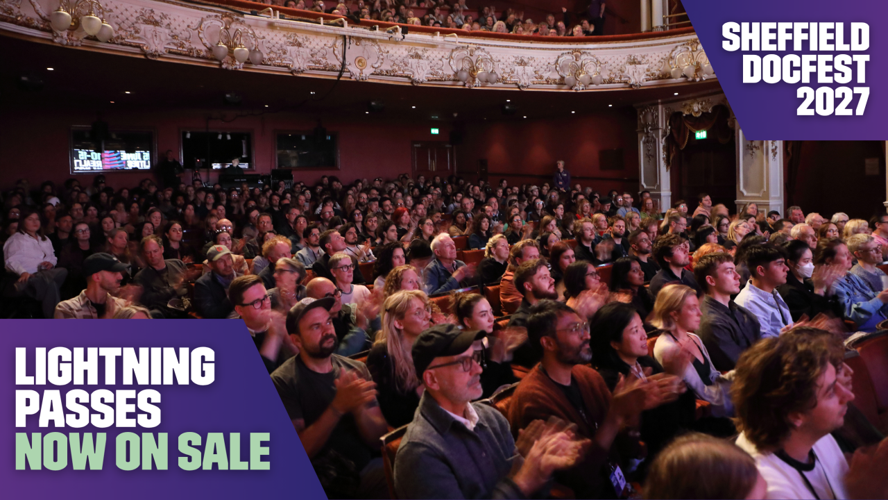 A busy audience watches an event at Sheffield DocFest.